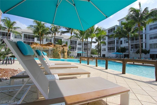 view of swimming pool featuring a patio area