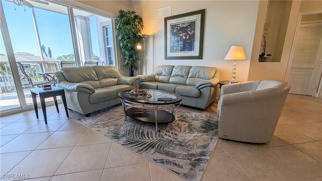 living room with light tile patterned floors