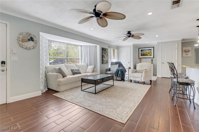 living room featuring ceiling fan, dark hardwood / wood-style flooring, and ornamental molding