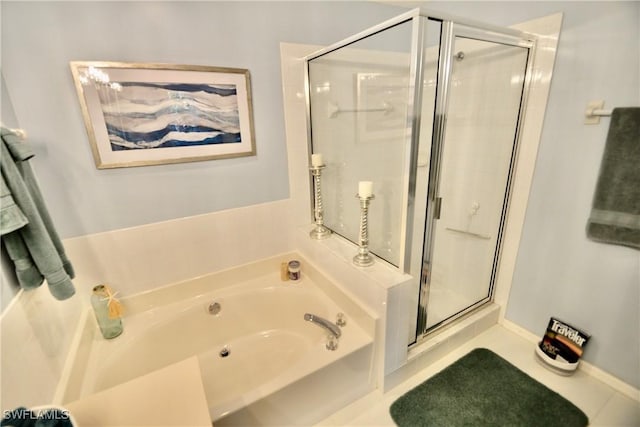 bathroom featuring tile patterned floors and plus walk in shower