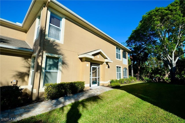 exterior space with a front lawn