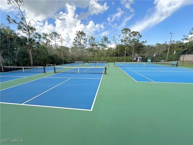 view of sport court with basketball hoop