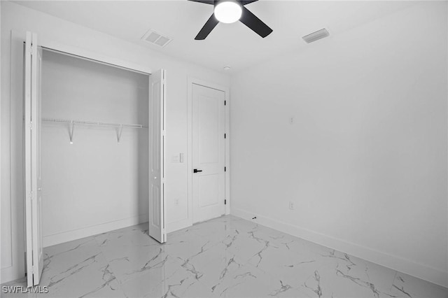 unfurnished bedroom with a closet and ceiling fan