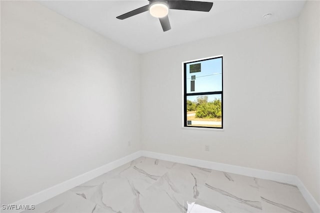 empty room featuring ceiling fan