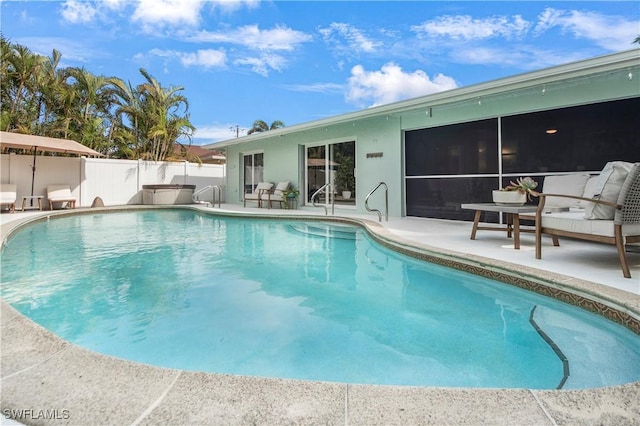 view of pool featuring a patio area