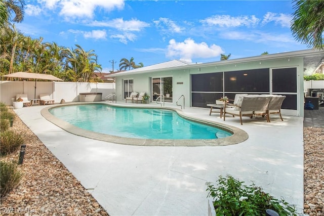 view of swimming pool featuring a patio area and an outdoor hangout area