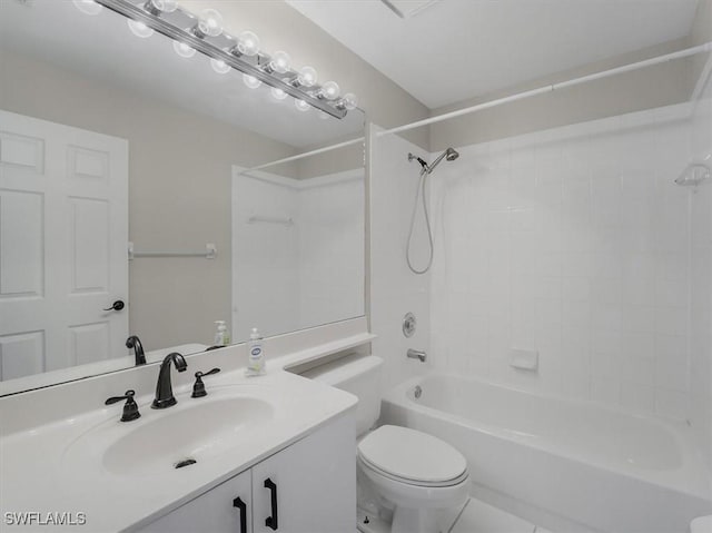 full bathroom with washtub / shower combination, vanity, toilet, and tile patterned flooring