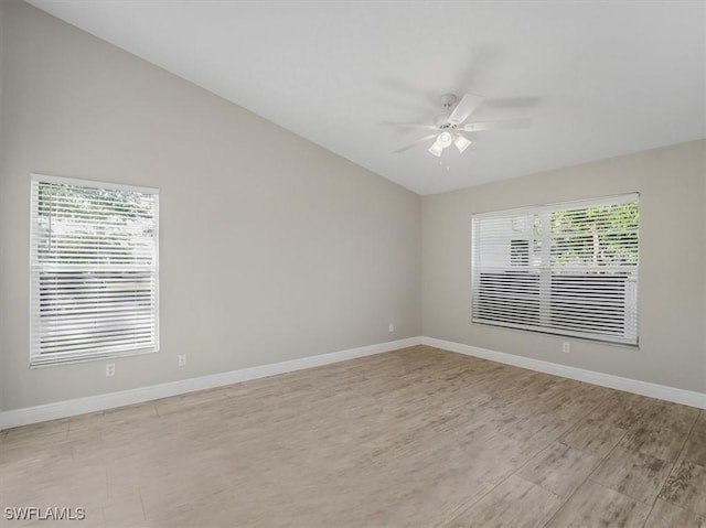 unfurnished room with ceiling fan and light wood-type flooring