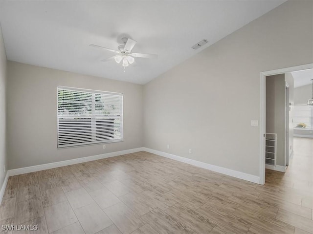 spare room featuring ceiling fan and light wood-type flooring