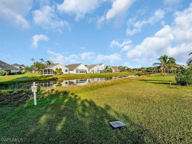 view of yard with a water view