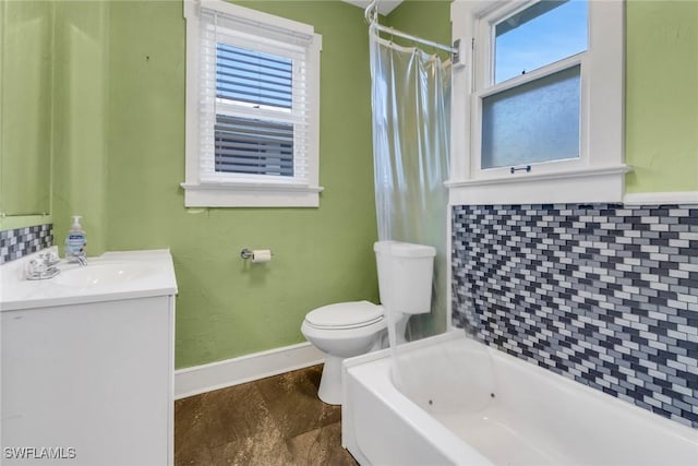 full bathroom featuring tasteful backsplash, shower / tub combo with curtain, vanity, and toilet