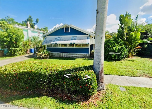 exterior space with a lawn