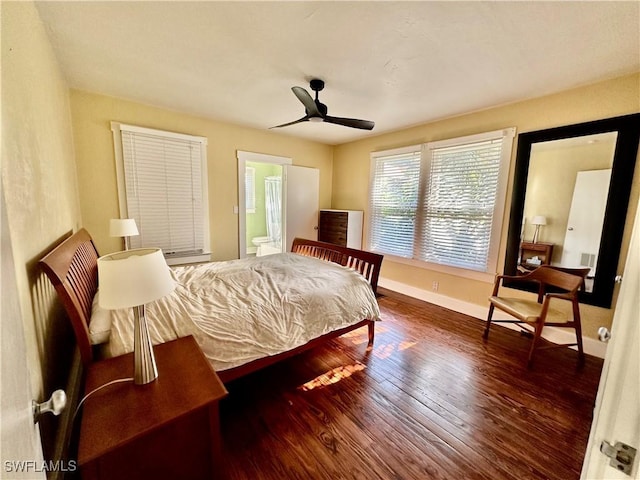 bedroom featuring ensuite bathroom, ceiling fan, and dark hardwood / wood-style floors