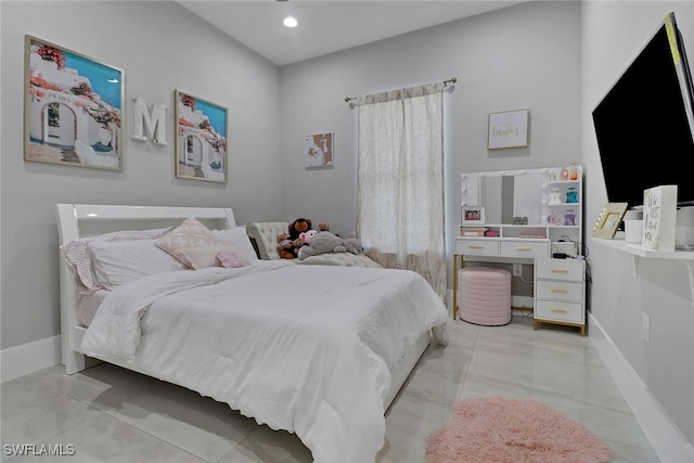 bedroom featuring light tile patterned floors