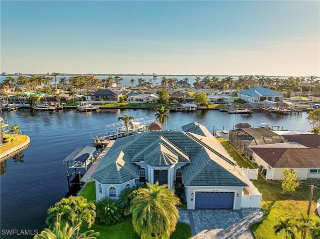 birds eye view of property featuring a water view