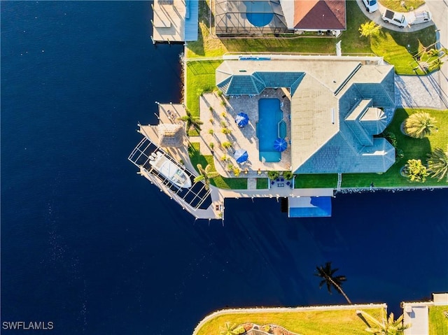 birds eye view of property featuring a water view