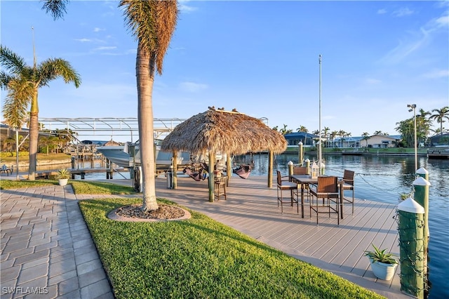 dock area with a water view