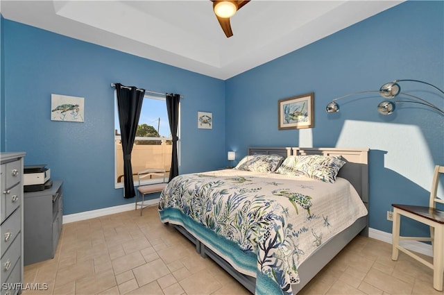 tiled bedroom with ceiling fan