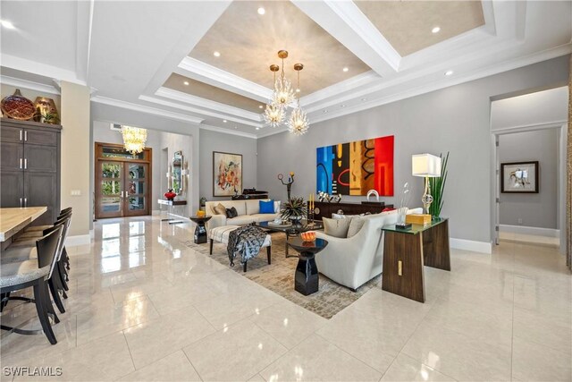 tiled living room with a raised ceiling, a chandelier, and ornamental molding