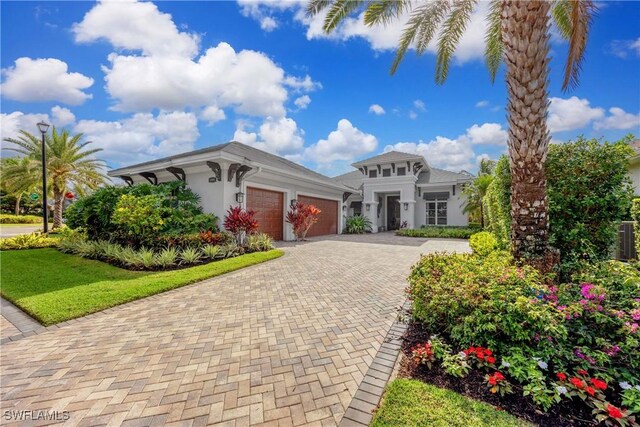 view of front of property with a garage