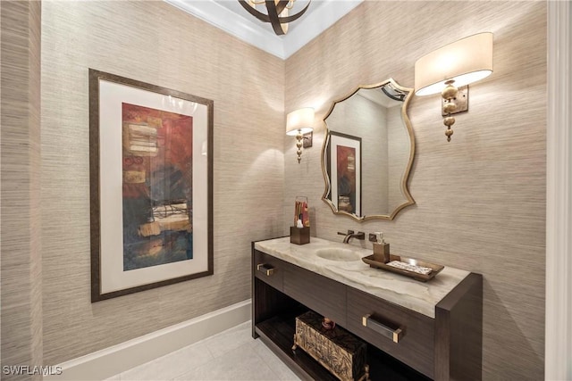 bathroom with tile patterned flooring and vanity