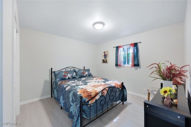 bedroom featuring light hardwood / wood-style flooring