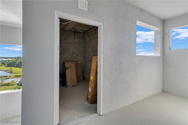 interior space featuring concrete floors