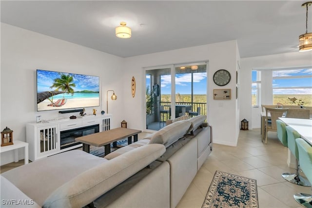 tiled living room with a wealth of natural light