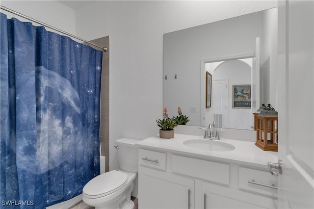 full bathroom with vanity, toilet, and shower / tub combo