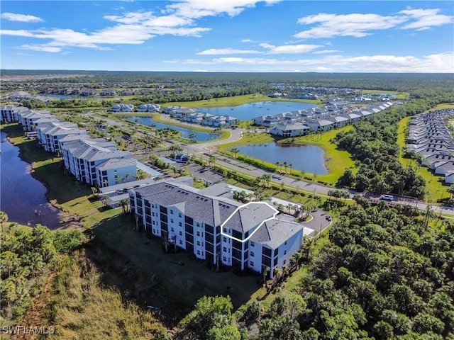 drone / aerial view with a water view