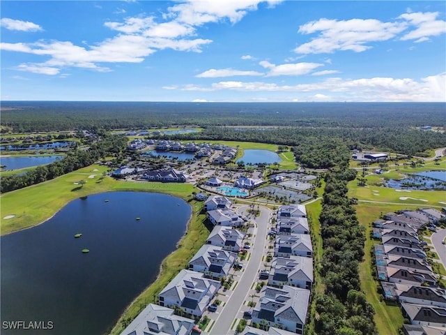 bird's eye view with a water view