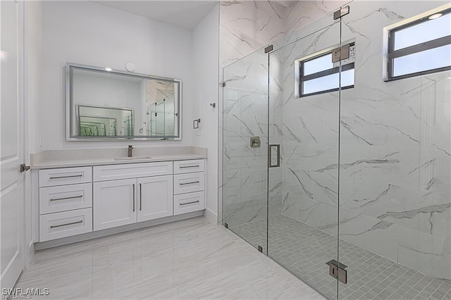 bathroom with vanity and walk in shower