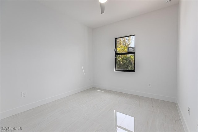 unfurnished room with ceiling fan