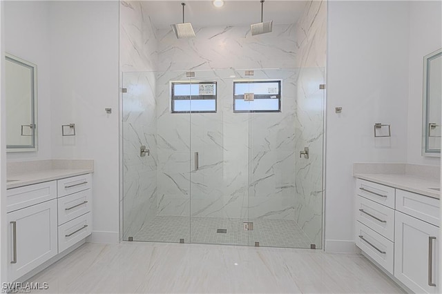 bathroom featuring vanity and walk in shower