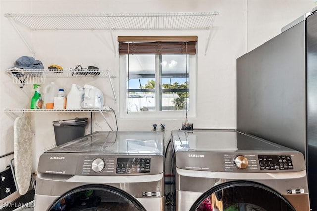 laundry area with washer and dryer