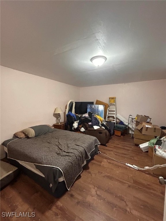 bedroom featuring hardwood / wood-style floors