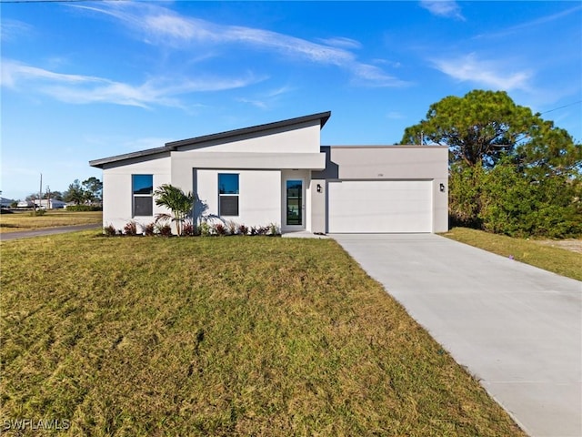 modern home with a garage and a front yard