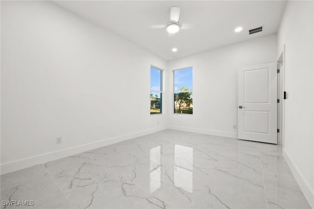 unfurnished room featuring ceiling fan