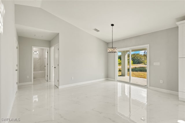 unfurnished room with a chandelier and lofted ceiling