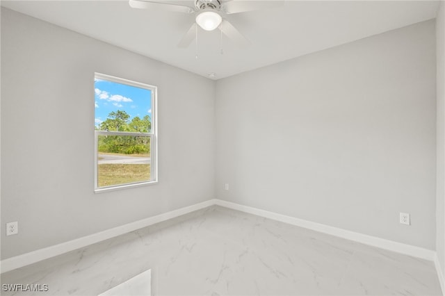 unfurnished room with ceiling fan