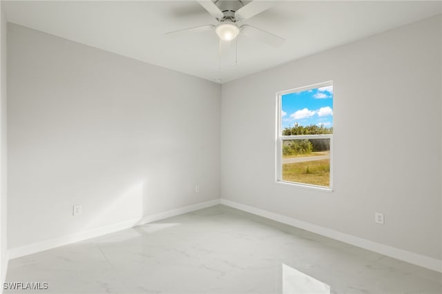 spare room featuring ceiling fan