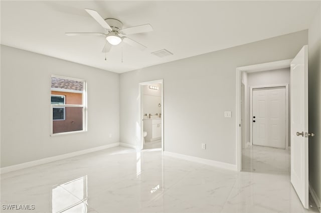 unfurnished bedroom featuring ceiling fan