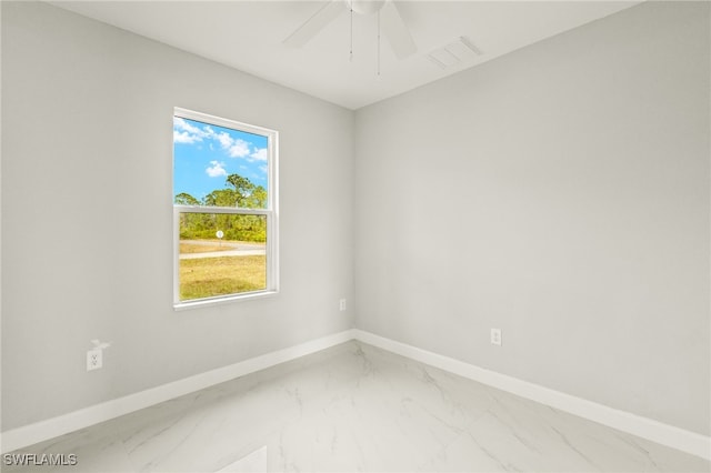 unfurnished room featuring ceiling fan