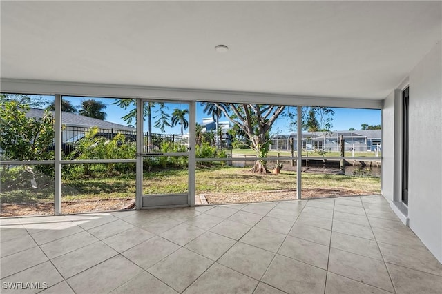 unfurnished sunroom with a healthy amount of sunlight