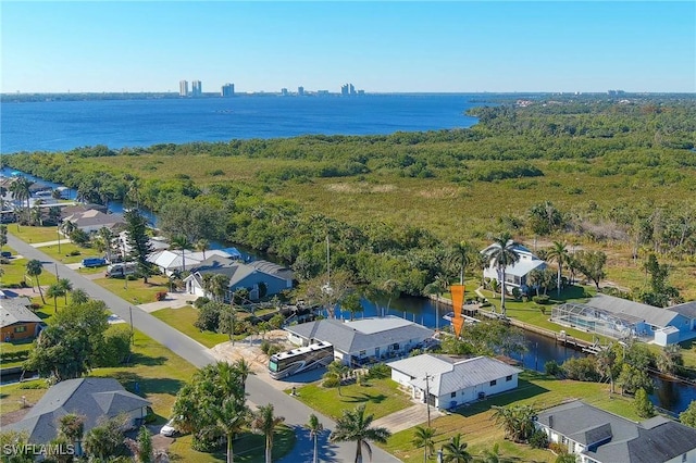 bird's eye view with a water view