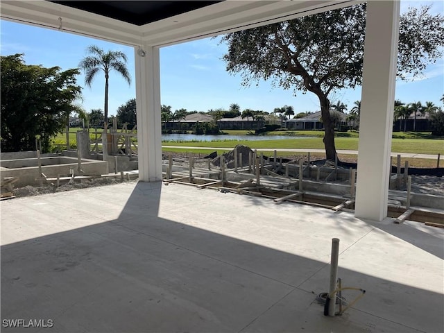 view of patio / terrace featuring a water view