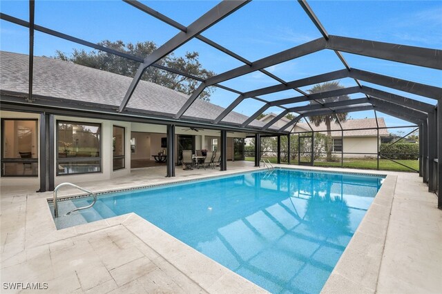 2037 Prince Dr, Naples, FL 34110 - outdoor pool with a patio, a ceiling fan, and a lanai