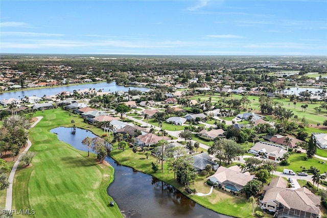 bird's eye view with a residential view, a water view, and golf course view