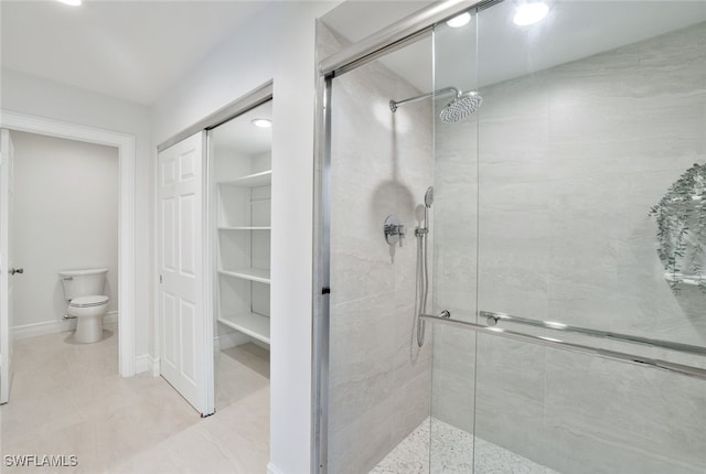 2037 Prince Dr, Naples, FL 34110 - bathroom with a shower stall, toilet, and a closet