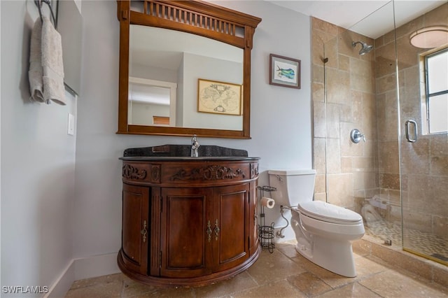 106 Pago Pago Dr W, Naples, FL 34113 - full bathroom with a stall shower, toilet, vanity, and stone tile floors